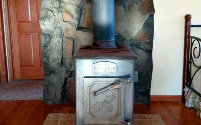 Take a rustic wood stove to the next level with faux-rock panels