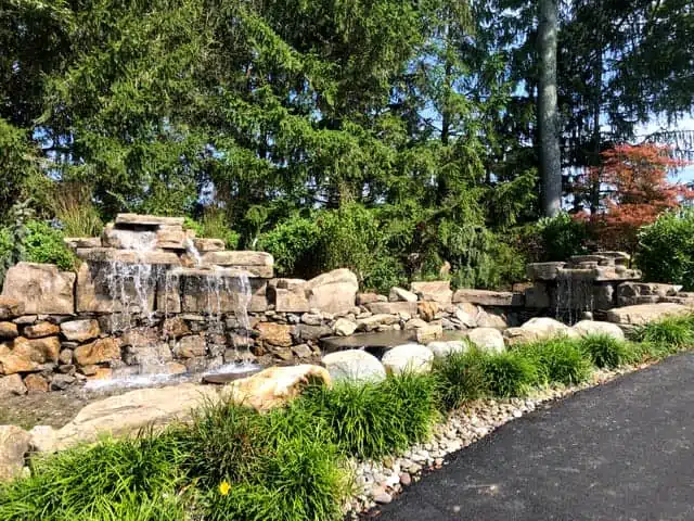 RicoRock 4 Foot Double and 3 Foot Modular Faux Rock Waterfall Kits at a Golf Course