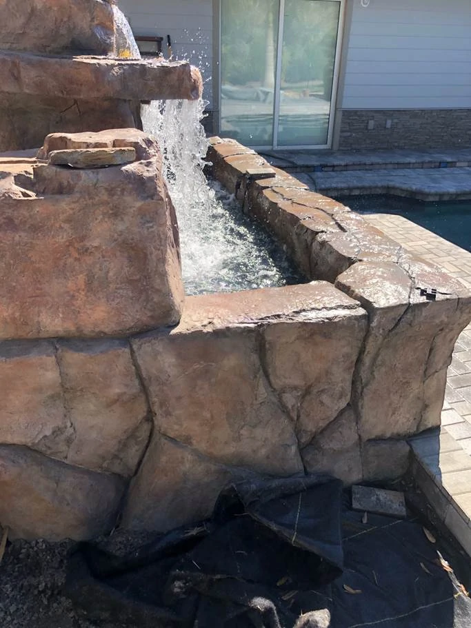 4 foot double waterfall adds drama to custom built pond 2