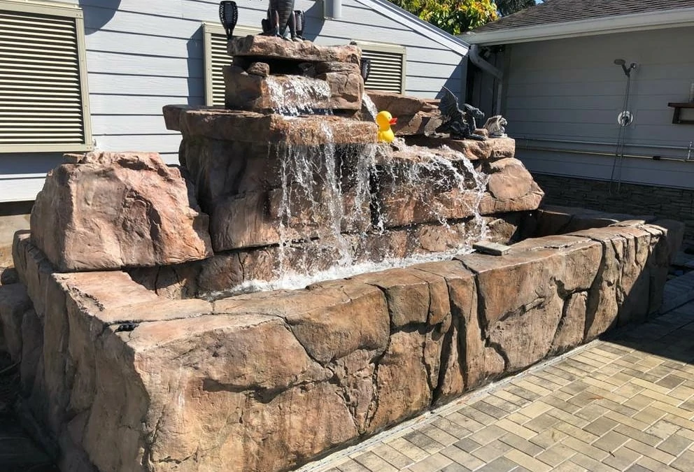 4-foot double waterfall adds drama to custom-built pond