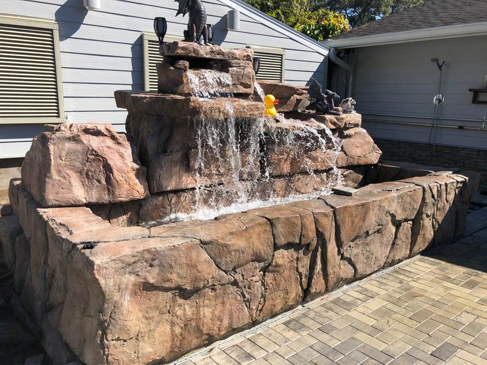 4 foot double waterfall adds drama to custom built pond